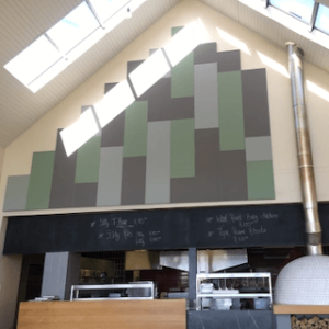 patterned design of acoustic panels on large wall in a restaurant in KwaZulu Natal