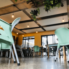 noise control products suspended from ceiling in restaurant to improve acoustics